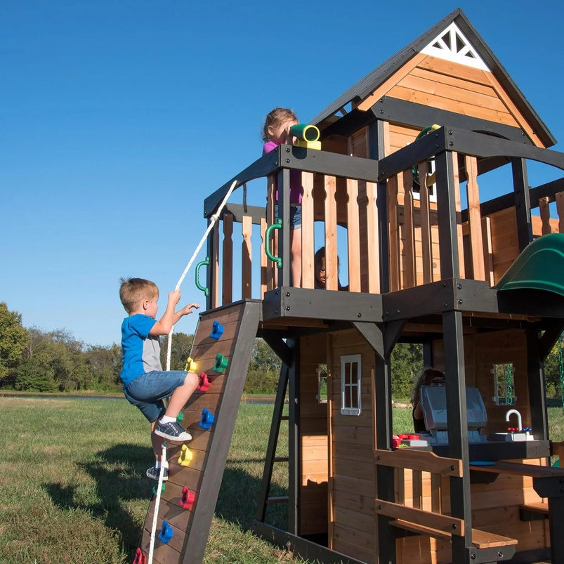 Backyard Discovery Canyon Creek Cedar Wood Swing Set with Wave Slide, Clubhouse, Play Kitchen, Picnic Area, Belt Swings, Web Swing, Rock Wall